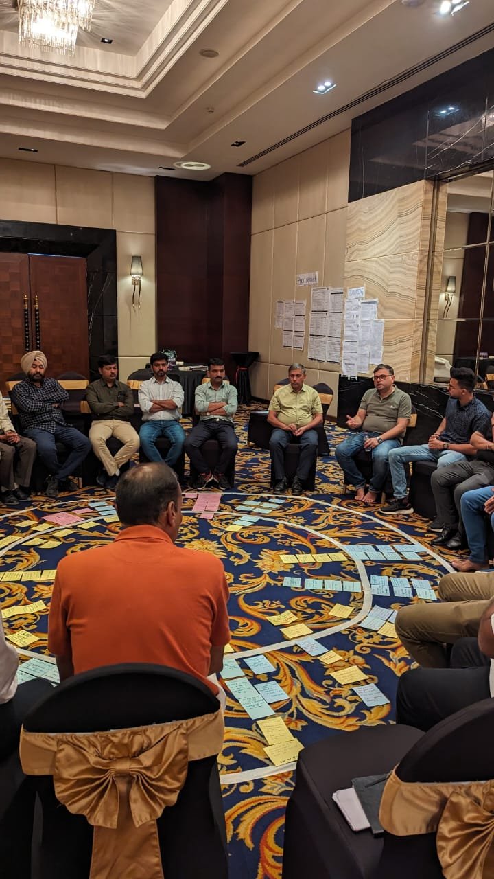 Department heads working through planning worksheets at a workshop