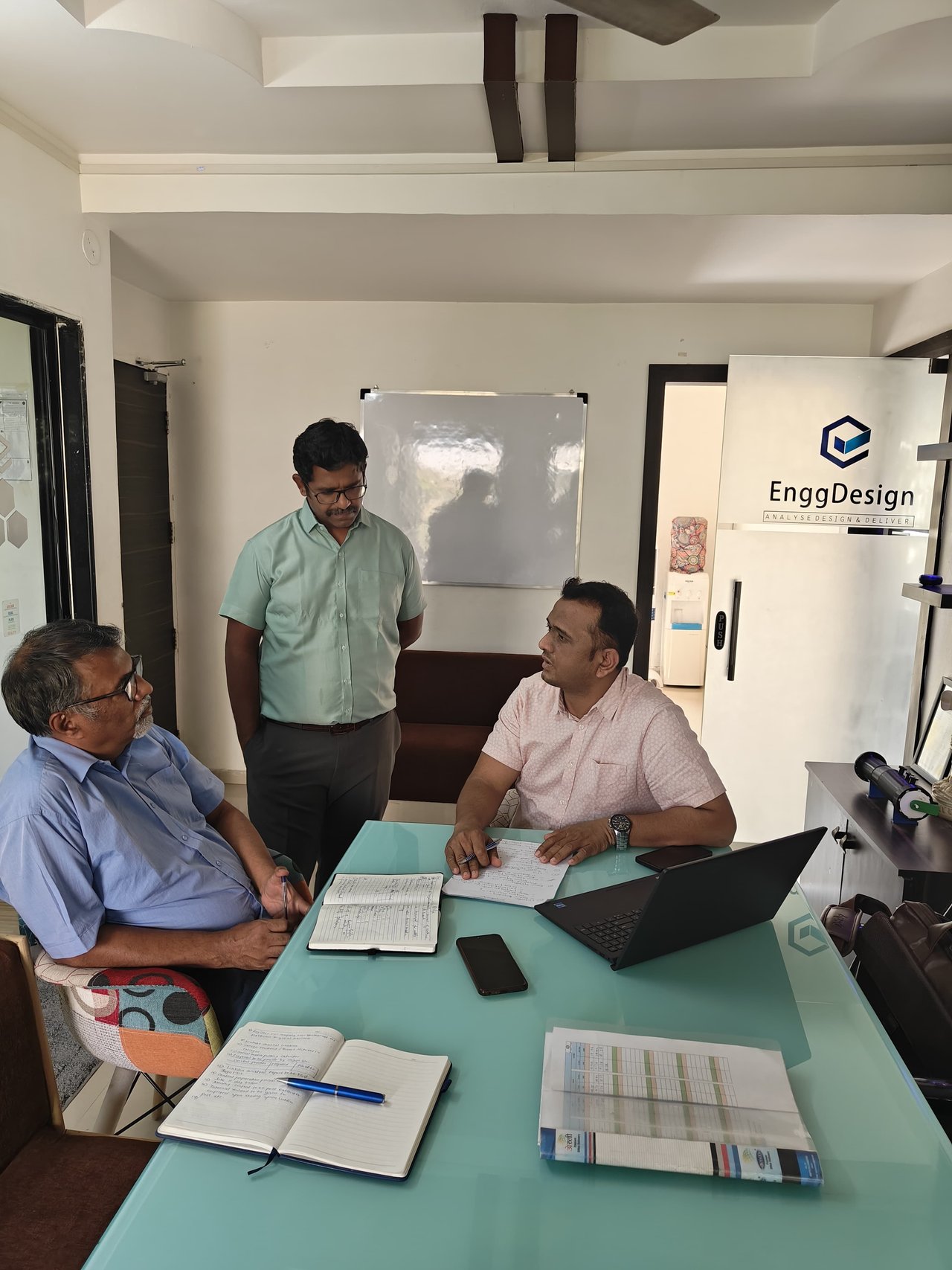 Leadership team reviewing notes together in the office
