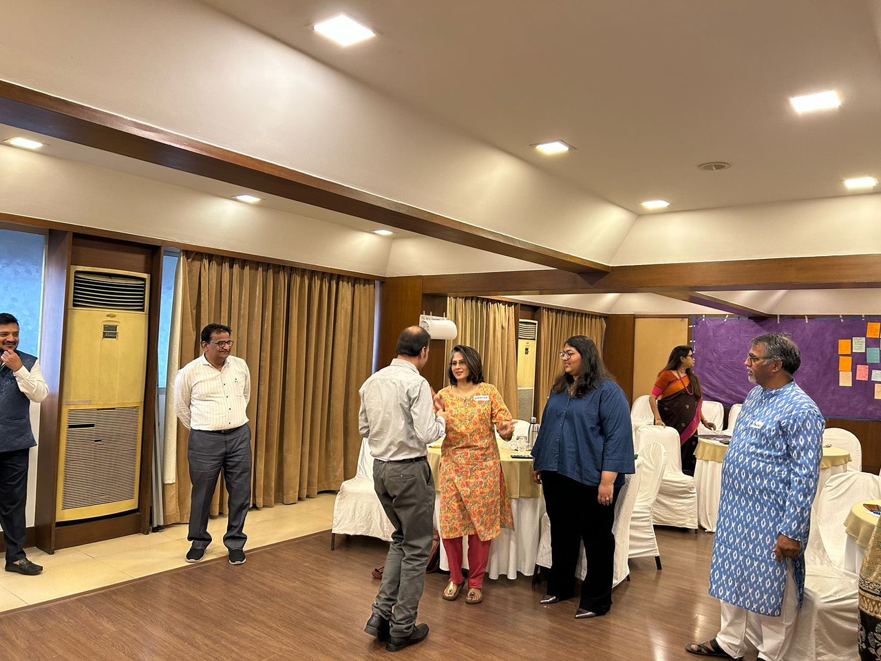Colleagues in a facilitated discussion session