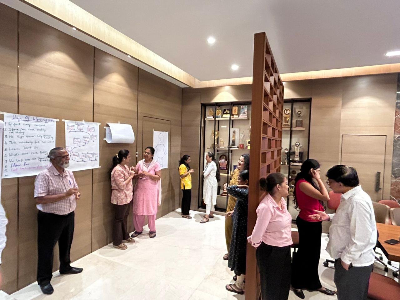 Team members reflecting together at the close of the workshop
